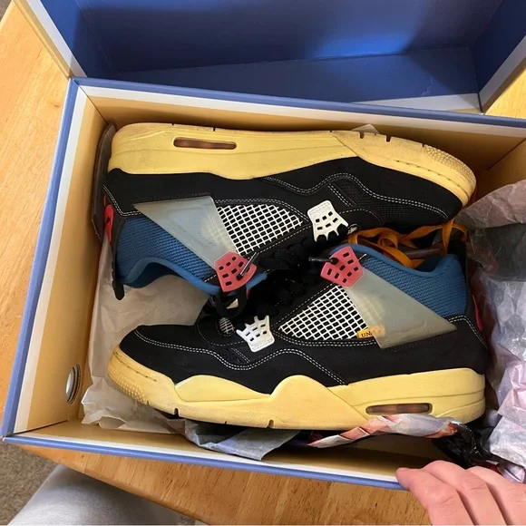 Air Jordan 4 Retro Low-Top in Black with Blue and Red Accents - Picture 6 of 11